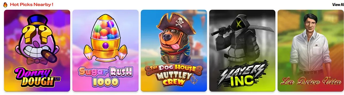 Hot Picks Nearby carousel showing five slot tiles: “Donny Dough,” “Sugar Rush 1000,” “The Dog House Muttley’s Crew,” “Slayers Inc,” and “La Dolce Vita,” with a “View All” link in the top-right.